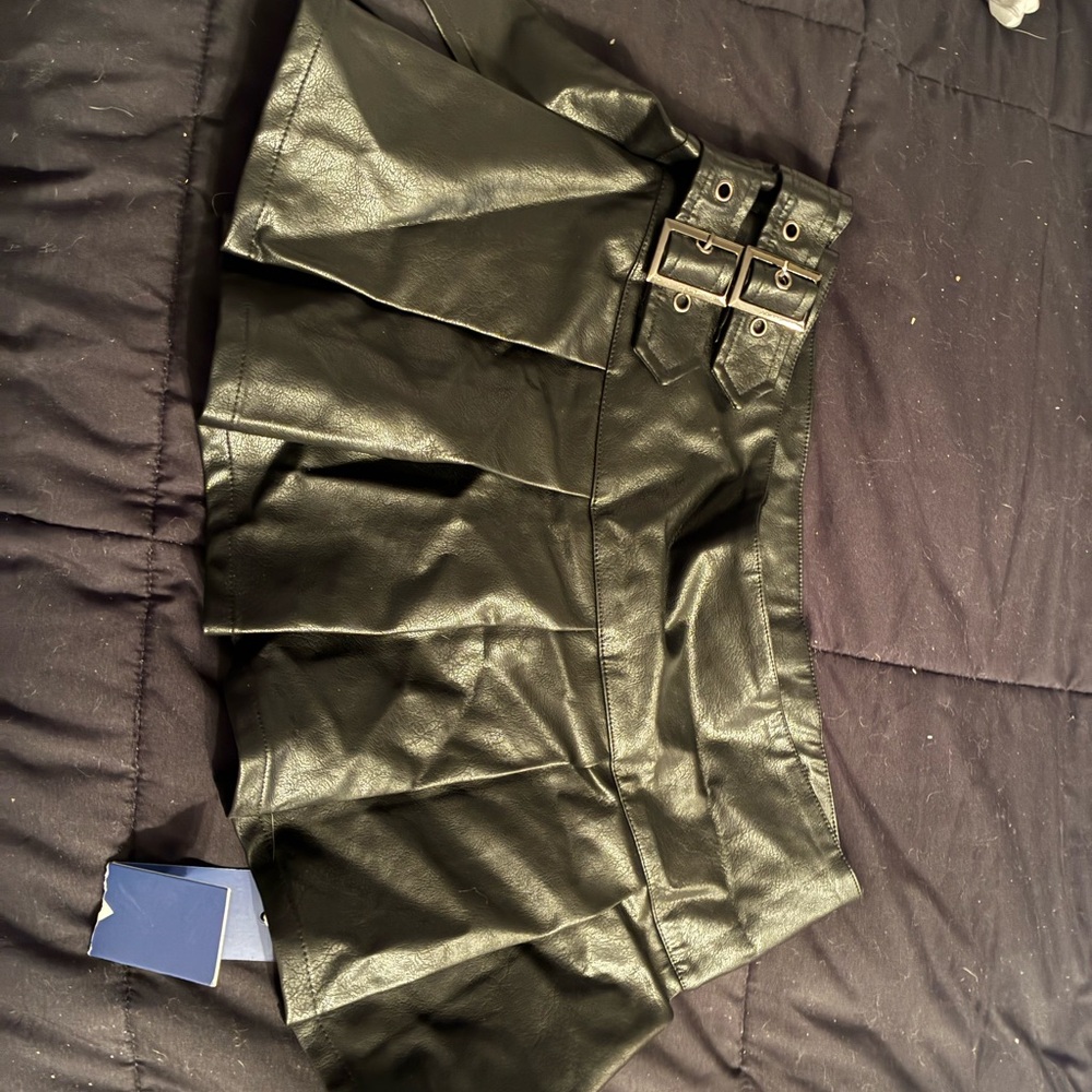 Stylish Black Mini Skirt with Buckle Detail